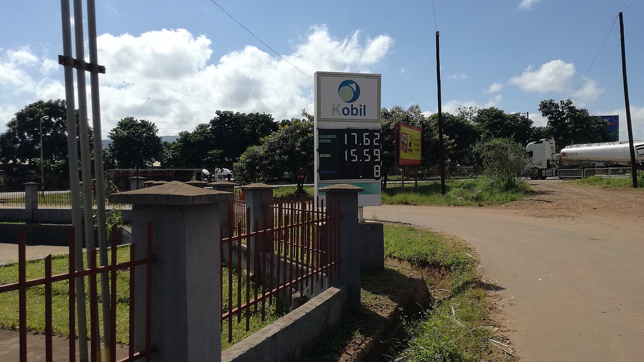 A fuel price sign at a filling station displaying petrol and diesel prices
