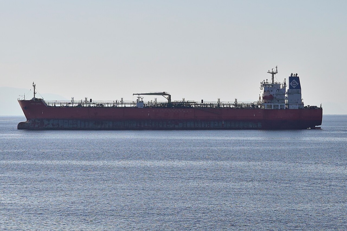 Oil tanker transiting at sea, carrying crude oil through international waterways